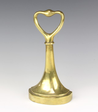 An Art Nouveau waisted brass door stop 27cm x 13cm x 5mc 