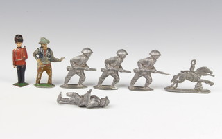 A lead guardsman, 1 other (f), ditto cowboy, a lead figure of a cavalryman and 4 other lead figures  