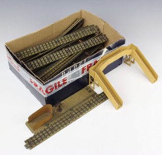 A Hornby Dublo metal footbridge together with a quantity of track 
