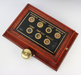 A servant's indicator board contained in a mahogany case marked Reading Room, Billiard Room, Card Room, Waiting Room, Lounge, Front Door, Back Door