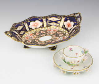 A Royal Crown Derby Imari pattern two handled dish 26cm together with a Meissen cabinet cup and saucer with encrusted flowers decorated with insects and flowers 