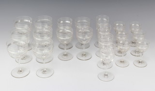 A suite of Edwardian glassware comprising 6 wine glasses, 4 sherry glasses, 4 liqueurs and 6 totts 