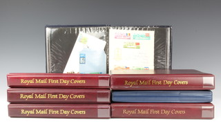 Seven albums of Elizabeth II GB first day covers 