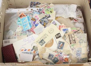 A quantity of loose world stamps