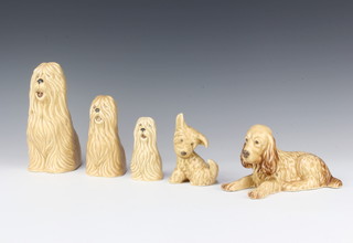 A Sylvac tan glazed figure of an Old English Sheepdog 5031 18cm, another 5302 12cm, a smaller ditto 5305 9cm, a Terrier 75 10cm and a reclining Spaniel 114 18cm 