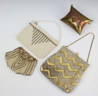 An Eastern copper and brass cushion shaped bag together with 3 beadwork bags 