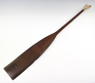 A curious Eastern hardwood paddle 98cm x 11cm 