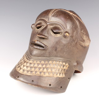 An Eastern carved hardwood mask 39cm x 23cm (cracked) 
