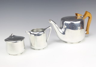 A 3 piece Picquot ware tea service comprising teapot, cream jug and lidded sugar bowl 