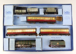 A Horny Dublo train set with locomotive tender and carriages, boxed 
