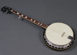 A Lorenzo 5 string banjo 