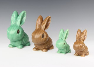 A green Sylvac rabbit 1026 17cm, a brown ditto 1065 16cm, a green ditto 1067 10cm, a brown ditto 1067 10cm 