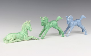 A green Sylvac figure of a reclining horse 1447 17cm, a green standing pony 1334 11cm and a blue ditto 1334 10cm  
