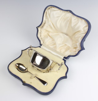 A silver quaich with caryatid handles Birmingham 1933 and a silver spoon Birmingham 1923, Maker Mappin and Webb, 155 grams 
