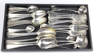 A quantity of silver Old English pattern cutlery, mixed dates, 60 ozs, 1865 grams 