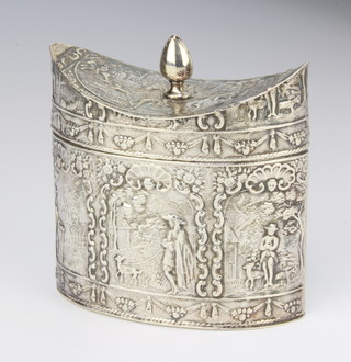 A 19th Century oval Dutch repousse silver tea caddy with acorn finial decorated with panels of figures in landscapes 135 grams, 10cm 