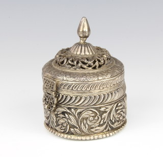A Continental circular silver box and cover with pierced lid and floral decoration 193 grams, 10cm 