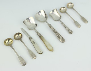 A Victorian silver caddy spoon Birmingham 1864, minor spoons and implements 104 grams gross 