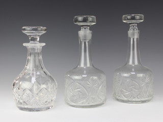 A cut glass mallet shaped decanter and stopper 23cm, 2 others