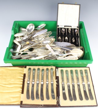 A quantity of silver plated cutlery including two cased sets