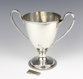 An Edwardian silver 2 handled trophy of plain form, London 1905 and a silver money clip, 660 grams, 21cm 