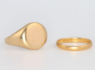 A 9ct yellow gold signet ring 10 grams and a 22ct gold wedding band size I 1.5 grams