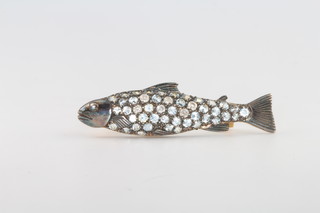 An Edwardian style brooch in the form of a fish set with diamonds and topaz 44mm