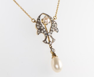 An Edwardian style diamond and pearl necklace on a 9ct yellow gold chain