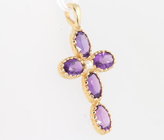 A yellow gold amethyst and seed pearl cross pendant 30mm x 16cmm 