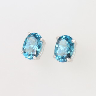 A pair of silver London topaz studs 