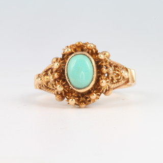An 18ct yellow gold turquoise set ring size N 1/2, gross weight 4.7 grams