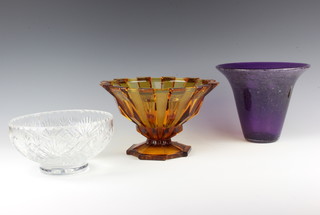 A purple Whitefriars style bubble glass trumpet shaped vase 19cm, a circular cut glass fruit bowl 20cm, an Art Deco amber pressed glass bowl 27cm (chips to rim) 