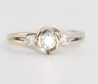 An 18ct white gold 3 stone diamond ring approx. 0.51ct, size M 