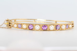 A Victorian 9ct yellow gold amethyst and pearl bracelet, 12 grams 