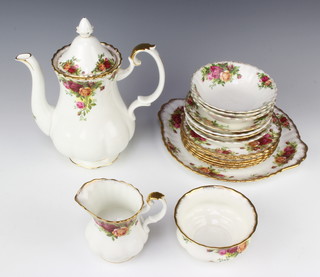 A Royal Albert Old Country Roses part service comprising coffee pot and lid, milk jug, sugar bowl, 3 dessert bowls, 3 saucers, 6 small plates, sandwich plate