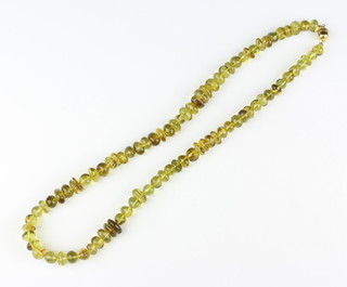 A green amber bead necklace 58cm 