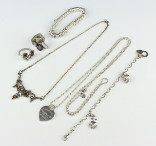 A silver bracelet and minor silver jewellery 122 grams 