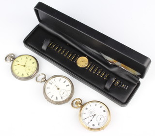 A gold plated pocket watch with seconds at 6 o'clock, 2 other pocket watches and a wristwatch 