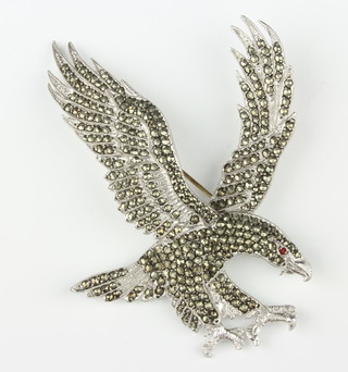 A silver and marcasite brooch in the form of an eagle 85mm x 70mm 