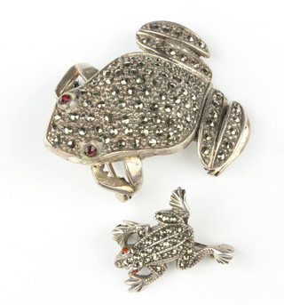 Two silver marcasite brooches in the form of frogs