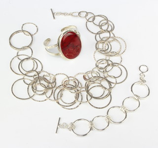 A silver bracelet and minor silver jewellery 139 grams