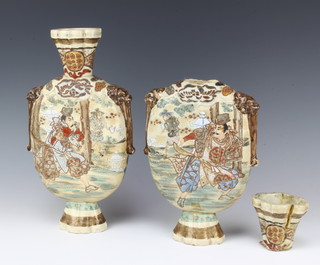 A pair of early 20th Century Satsuma bottle vases decorated with figures 31cm 