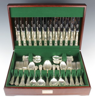 A canteen of silver Kings Pattern cutlery for 12 comprising 12 coffee spoons, 12 tea spoons, 12 dessert forks, 12 dessert spoons, 12 dinner forks, 12 soup spoons, 2 table spoons, together with 12 dessert knives with silver handles and 12 dinner knives with silver handles, 160 ozs, contained in a mahogany canteen with a silver inscribed plaque, Sheffield 1991 
