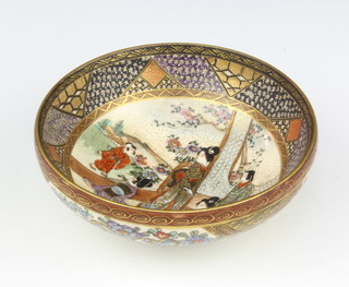 An early 20th Century Satsuma circular bowl decorated with figures on a pavillion terrace, signed 12cm 