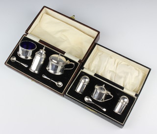 Two cased 3 piece silver condiments, both Birmingham 1927, 170 grams 
