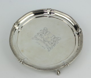 A silver commemorative card tray with bead rim raised on claw and ball feet, Birmingham 1973, 206 grams 15.5cm, no.167/500, boxed