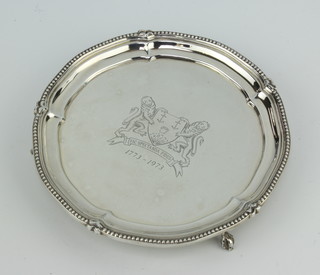 A silver commemorative card tray with beaded rim, raised on claw and ball feet Birmingham 1973, 206 grams, 15.5cm no.166/500, boxed