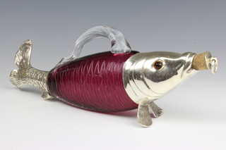 A silver plated mounted cranberry glass ewer in the form of a fish with glass eyes 33cm 