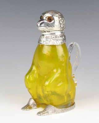 A yellow glass claret jug with silver plated mounts in the form of a seated monkey with glass eyes 20cm 