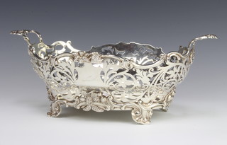 An Edwardian pierced silver 2 handled basket with floral and scroll decoration, decorated with fruits, London 1902, 33cm, 890 grams